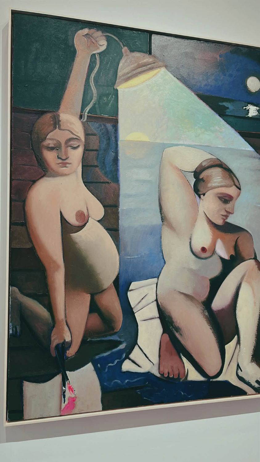 燈下兩位女子的油畫